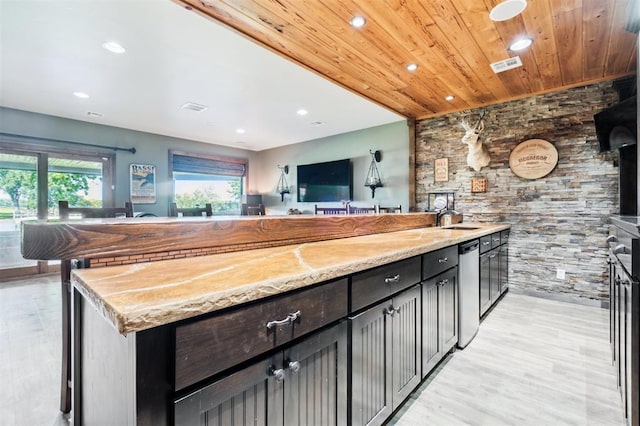 39 E Shore Dr, Arcadia, OK 73007 - kitchen featuring recessed lighting, light stone counters, light wood-type flooring, and wooden ceiling
