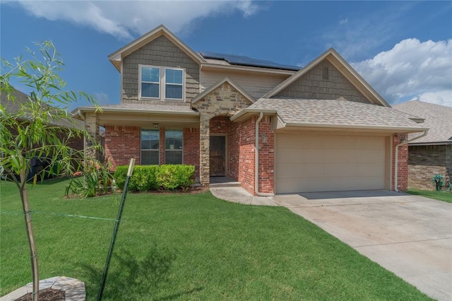 9409 NW 91st St, Yukon, OK 73099 - view of front of house with an attached garage, roof mounted solar panels, a front lawn, and concrete driveway