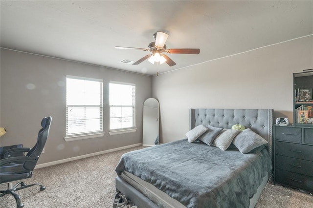 9409 NW 91st St, Yukon, OK 73099 - bedroom with carpet, ceiling fan, and a desk