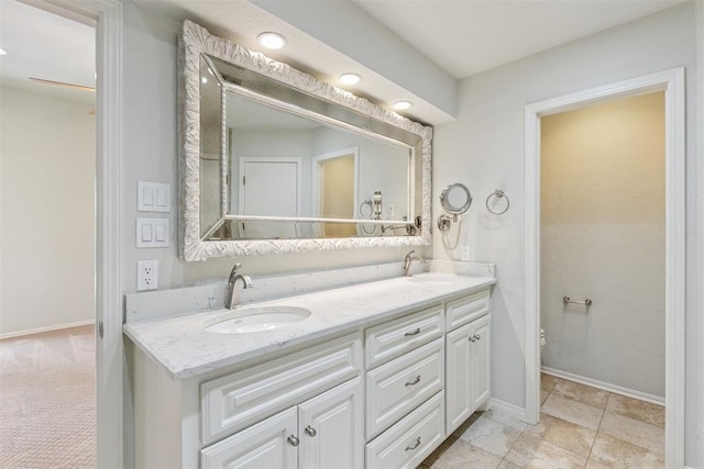 812 Old Bugle Rd, Edmond, OK 73003 - bathroom with double vanity and recessed lighting