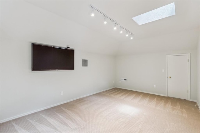 812 Old Bugle Rd, Edmond, OK 73003 - additional living space featuring a skylight, light carpet, and lofted ceiling