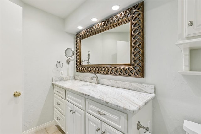 812 Old Bugle Rd, Edmond, OK 73003 - bathroom featuring vanity, tile patterned floors, and recessed lighting