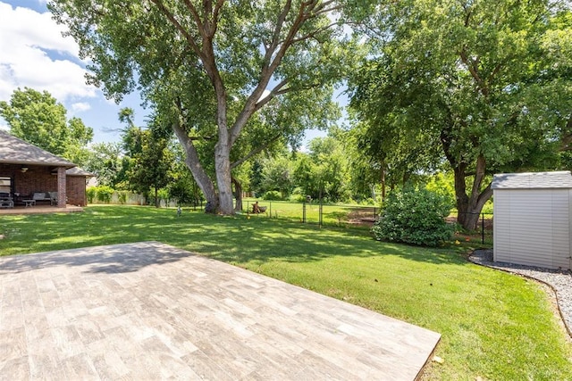 812 Old Bugle Rd, Edmond, OK 73003 - fenced backyard with a patio and a storage shed