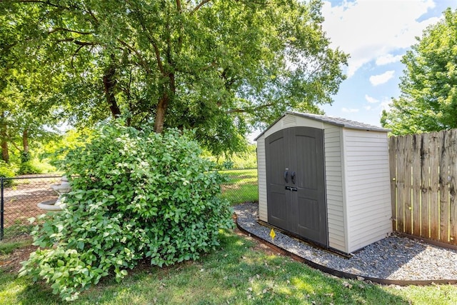 812 Old Bugle Rd, Edmond, OK 73003 - view of shed with a fenced backyard