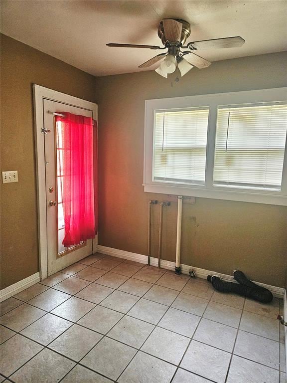 934 E Elm St, Altus, OK 73521 - foyer entrance with light tile patterned floors and a ceiling fan