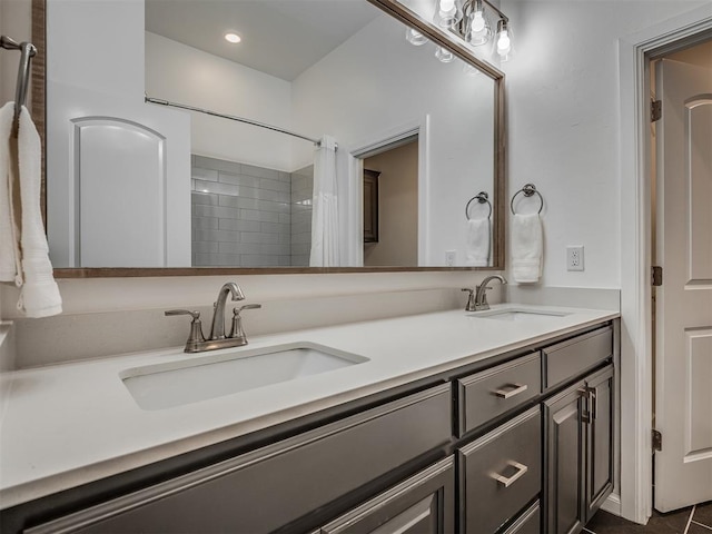 3760 Black Mesa Rd, Norman, OK 73071 - full bathroom with double vanity, tiled shower, and recessed lighting