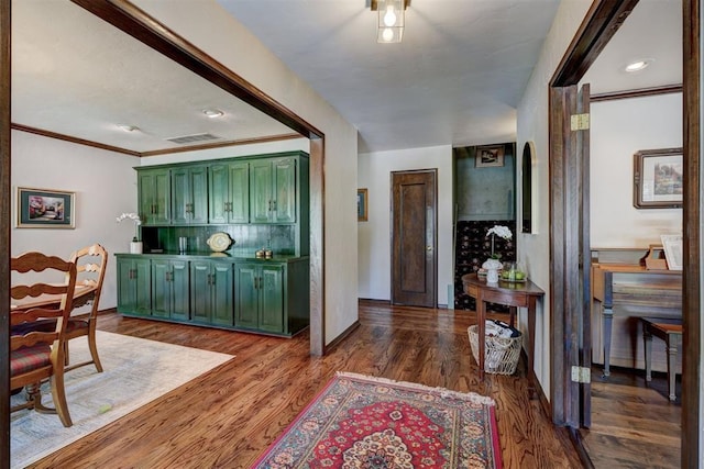 12108 Blue Sage Rd, Oklahoma City, OK 73120 - foyer with wood finished floors and ornamental molding