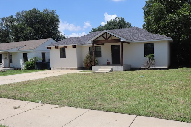 1361 Chestnut Dr, Oklahoma City, OK 73119 - view of front of property with a front lawn, stucco siding, and roof with shingles