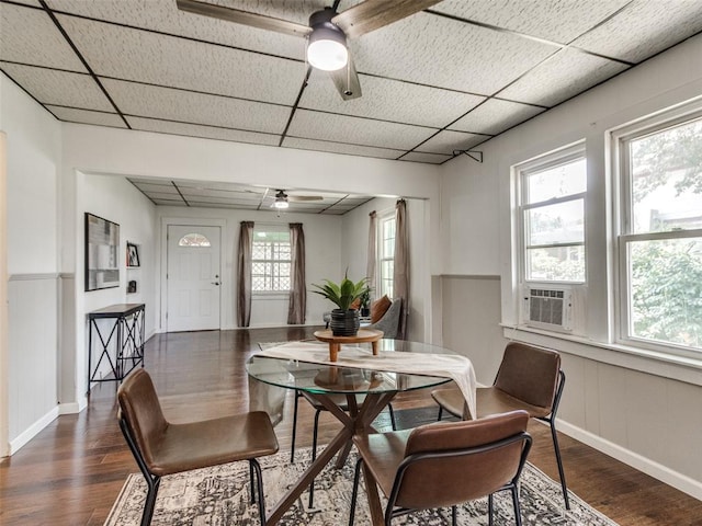610 N Choctaw Ave, El Reno, OK 73036 - dining area with a ceiling fan, dark wood-type flooring, a paneled ceiling, and cooling unit