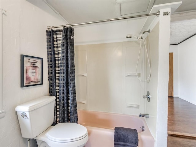 610 N Choctaw Ave, El Reno, OK 73036 - bathroom featuring shower / bath combo and wood finished floors