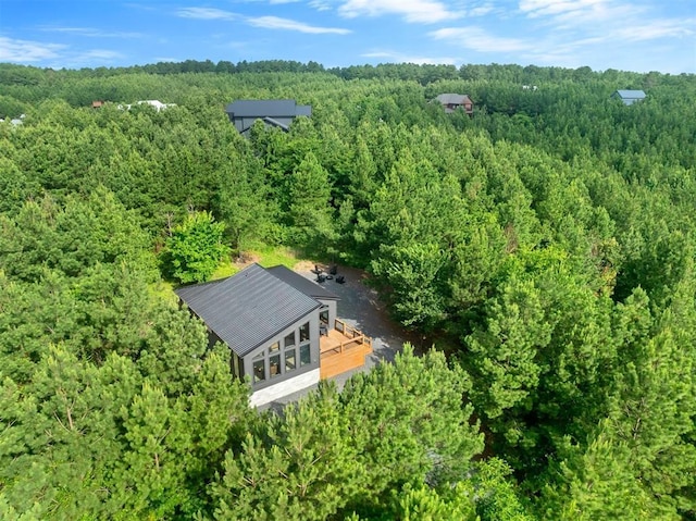 105 S Spruce Trl, Broken Bow, OK 74728 - view of subject property featuring a heavily wooded area
