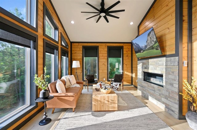 105 S Spruce Trl, Broken Bow, OK 74728 - sunroom / solarium with wood walls, recessed lighting, wood finished floors, and high vaulted ceiling