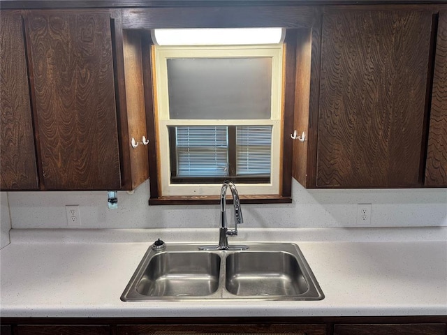 818 W Watts St, El Reno, OK 73036 - kitchen with dark brown cabinetry and light countertops