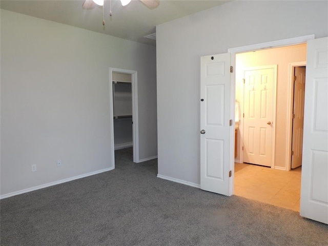 6036 SE 66th St, Oklahoma City, OK 73135 - unfurnished bedroom featuring carpet, a walk in closet, and ceiling fan