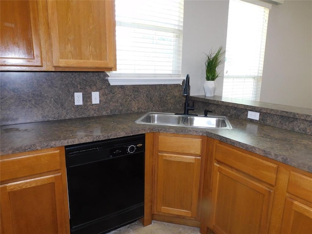 6036 SE 66th St, Oklahoma City, OK 73135 - kitchen with black dishwasher, dark countertops, backsplash, and brown cabinets