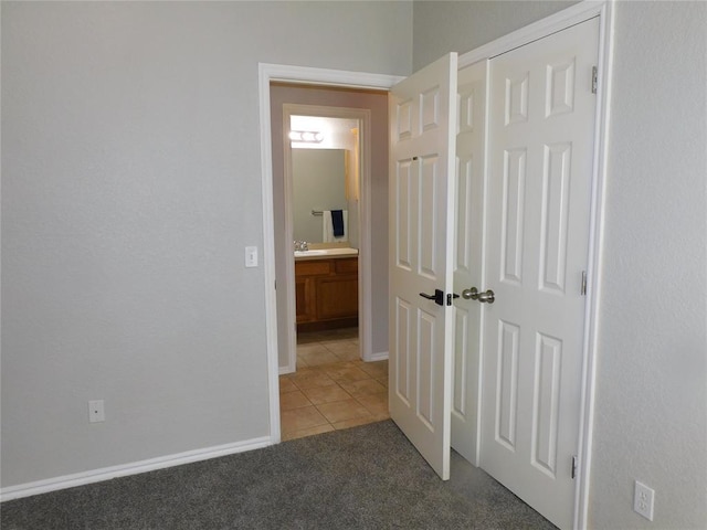 6036 SE 66th St, Oklahoma City, OK 73135 - hall featuring light tile patterned floors and light carpet