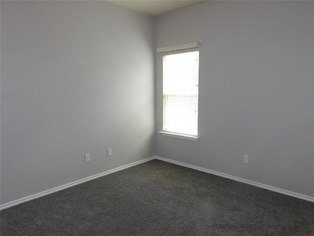 6036 SE 66th St, Oklahoma City, OK 73135 - unfurnished room with dark carpet and baseboards