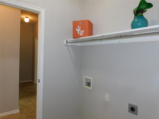 6036 SE 66th St, Oklahoma City, OK 73135 - laundry area with hookup for a washing machine, hookup for an electric dryer, and tile patterned flooring
