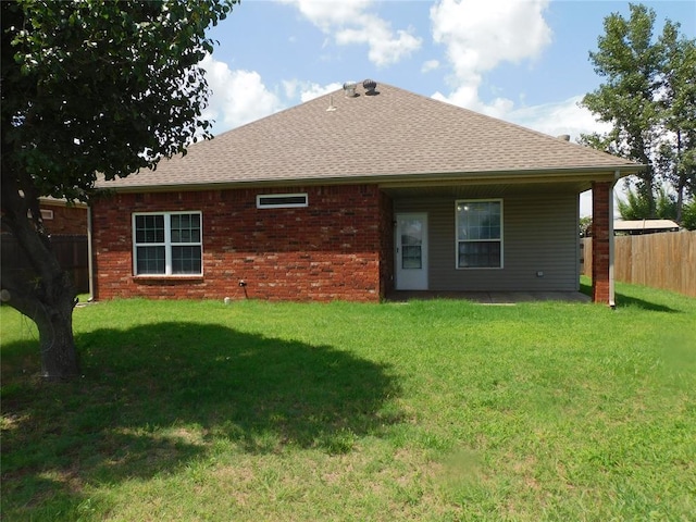 6036 SE 66th St, Oklahoma City, OK 73135 - back of property with roof with shingles and brick siding