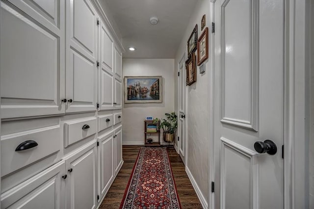 1601 Hazelhurst, Edmond, OK 73013 - hallway with dark wood finished floors and recessed lighting
