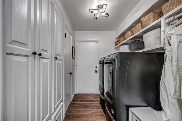 1601 Hazelhurst, Edmond, OK 73013 - laundry area featuring washer and dryer and dark wood finished floors