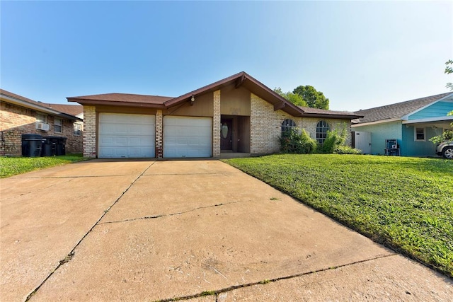 1021 SW 1st St, Moore, OK 73160 - mid-century inspired home featuring brick siding, a garage, concrete driveway, and a front yard