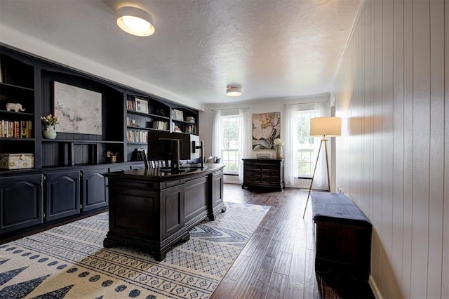 5305 Circle Gln, Edmond, OK 73025 - office featuring a textured ceiling, wood finished floors, and wood walls