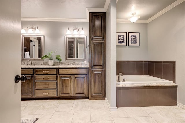 5305 Circle Gln, Edmond, OK 73025 - bathroom with double vanity, a garden tub, ornamental molding, and marble finish floors