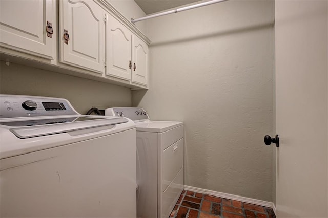5305 Circle Gln, Edmond, OK 73025 - laundry area with separate washer and dryer, cabinet space, and brick patterned floors