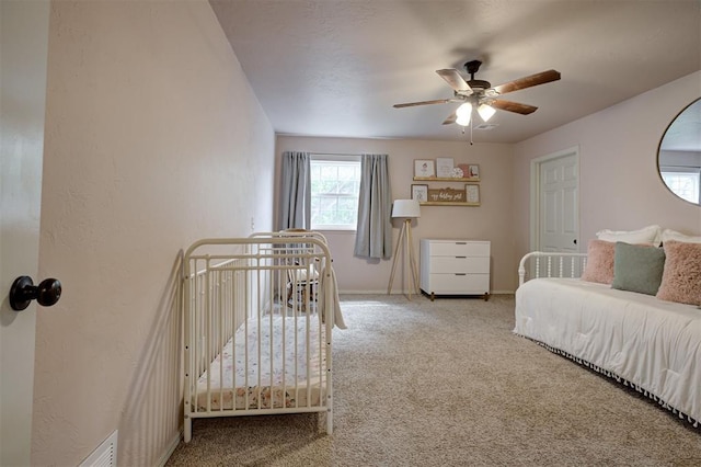 5305 Circle Gln, Edmond, OK 73025 - carpeted bedroom featuring baseboards and ceiling fan