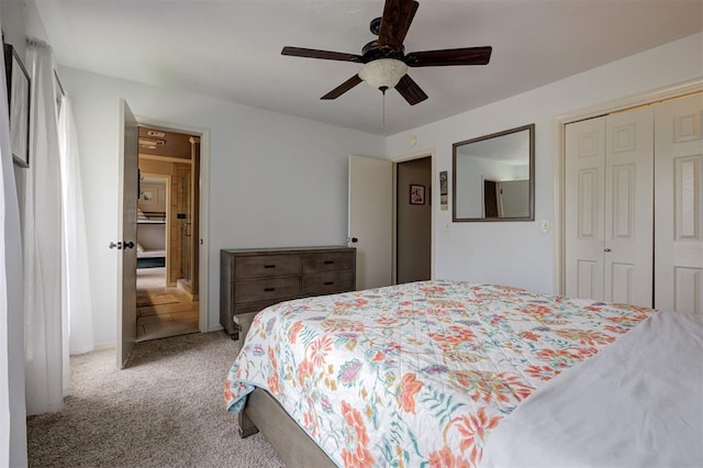 5305 Circle Gln, Edmond, OK 73025 - bedroom with light carpet, a closet, and ceiling fan