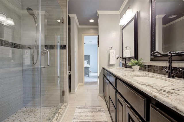 5305 Circle Gln, Edmond, OK 73025 - full bathroom featuring ornamental molding, double vanity, ensuite bath, a stall shower, and tile patterned floors