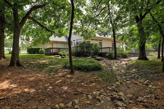 5305 Circle Gln, Edmond, OK 73025 - view of yard featuring a wooden deck