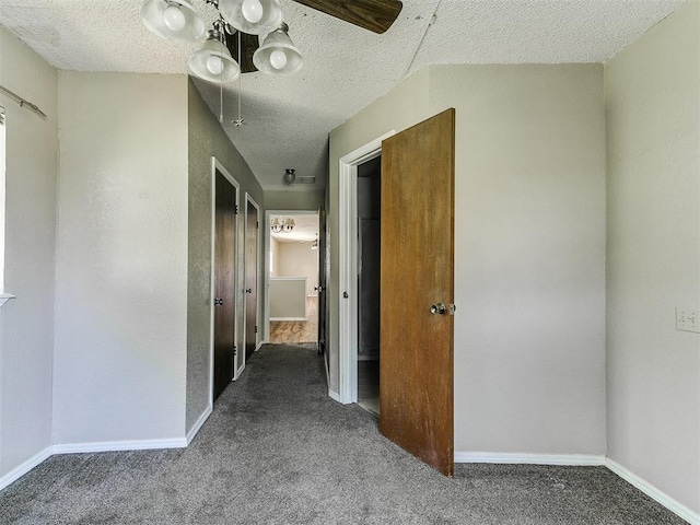 2618 NW Apache Rd, Piedmont, OK 73078 - hall with carpet floors and a textured ceiling