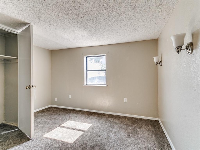 2618 NW Apache Rd, Piedmont, OK 73078 - unfurnished bedroom featuring carpet, a textured ceiling, and a closet