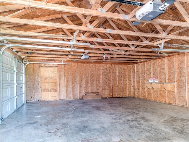 2618 NW Apache Rd, Piedmont, OK 73078 - garage featuring a garage door opener
