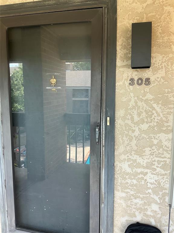 600 NW 4th St Unit 305N, Oklahoma City, OK 73102 - property entrance with stucco siding