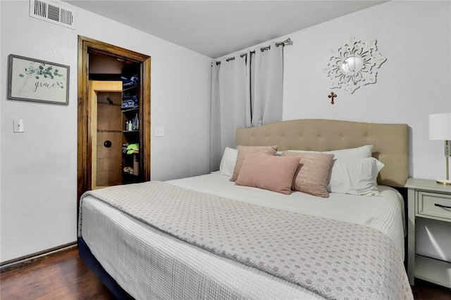 7007 NW 61st St, Bethany, OK 73008 - bedroom with dark wood-type flooring
