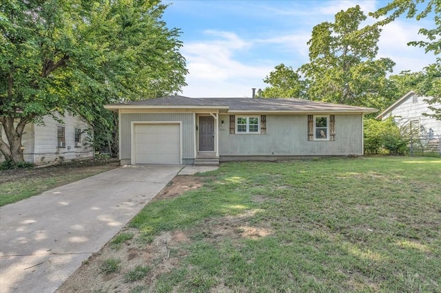 1113 S Locust Dr, Midwest City, OK 73110 - ranch-style home featuring concrete driveway, a front yard, and an attached garage
