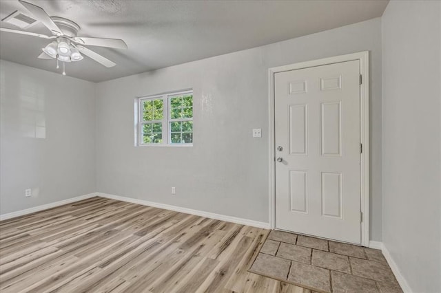 1113 S Locust Dr, Midwest City, OK 73110 - foyer with ceiling fan and light wood-style flooring