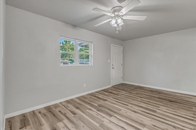 1113 S Locust Dr, Midwest City, OK 73110 - unfurnished room with light wood-style flooring and a ceiling fan