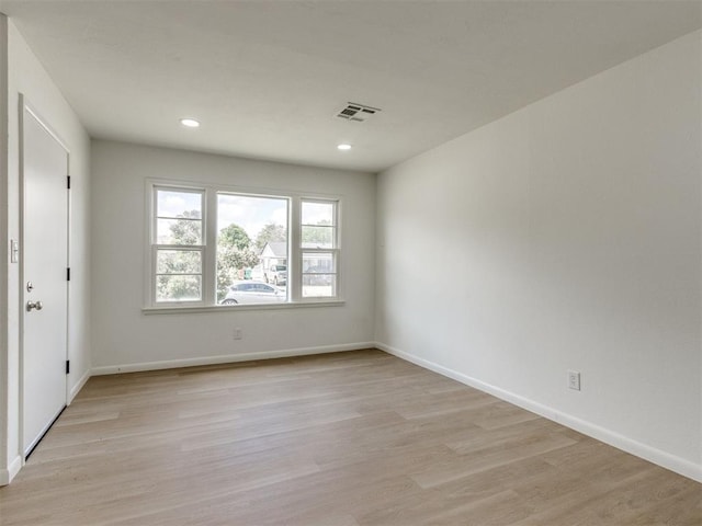 2340 SW 46th St, Oklahoma City, OK 73119 - empty room featuring light wood-type flooring and recessed lighting