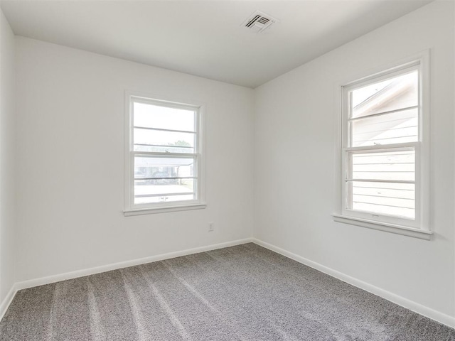 2340 SW 46th St, Oklahoma City, OK 73119 - spare room with carpet flooring and healthy amount of natural light