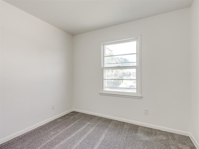 2340 SW 46th St, Oklahoma City, OK 73119 - carpeted spare room featuring baseboards