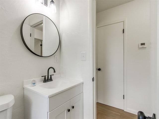 2340 SW 46th St, Oklahoma City, OK 73119 - bathroom with vanity and wood finished floors