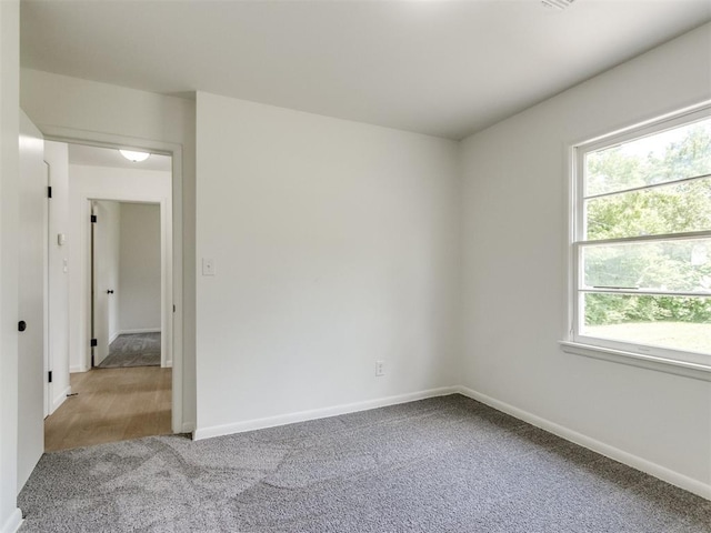 2340 SW 46th St, Oklahoma City, OK 73119 - carpeted spare room featuring baseboards
