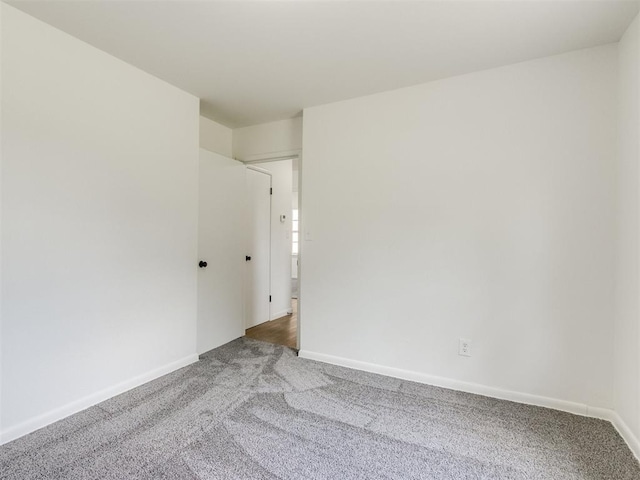 2340 SW 46th St, Oklahoma City, OK 73119 - empty room featuring carpet floors and baseboards