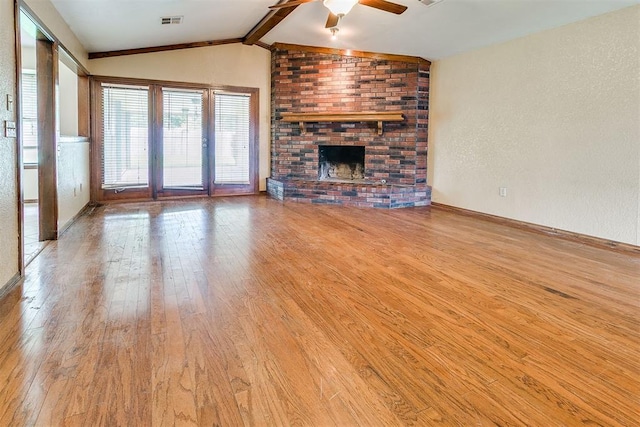 10201 Mantle Ct, Oklahoma City, OK 73162 - unfurnished living room with wood finished floors, ceiling fan, and a fireplace
