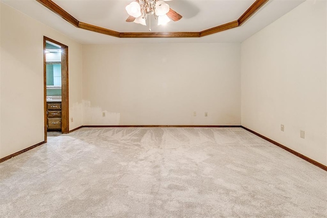 10201 Mantle Ct, Oklahoma City, OK 73162 - carpeted empty room featuring crown molding, a raised ceiling, and a ceiling fan