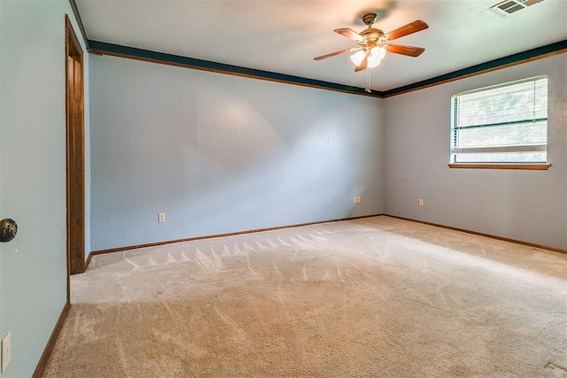 10201 Mantle Ct, Oklahoma City, OK 73162 - carpeted spare room with a ceiling fan and crown molding